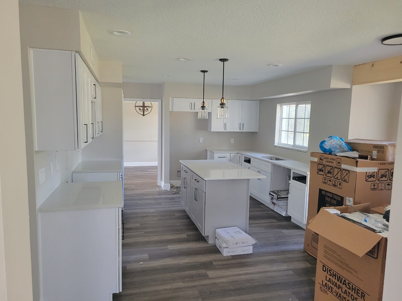 White shaker kitchen under construction by 1 Stop Cabinets