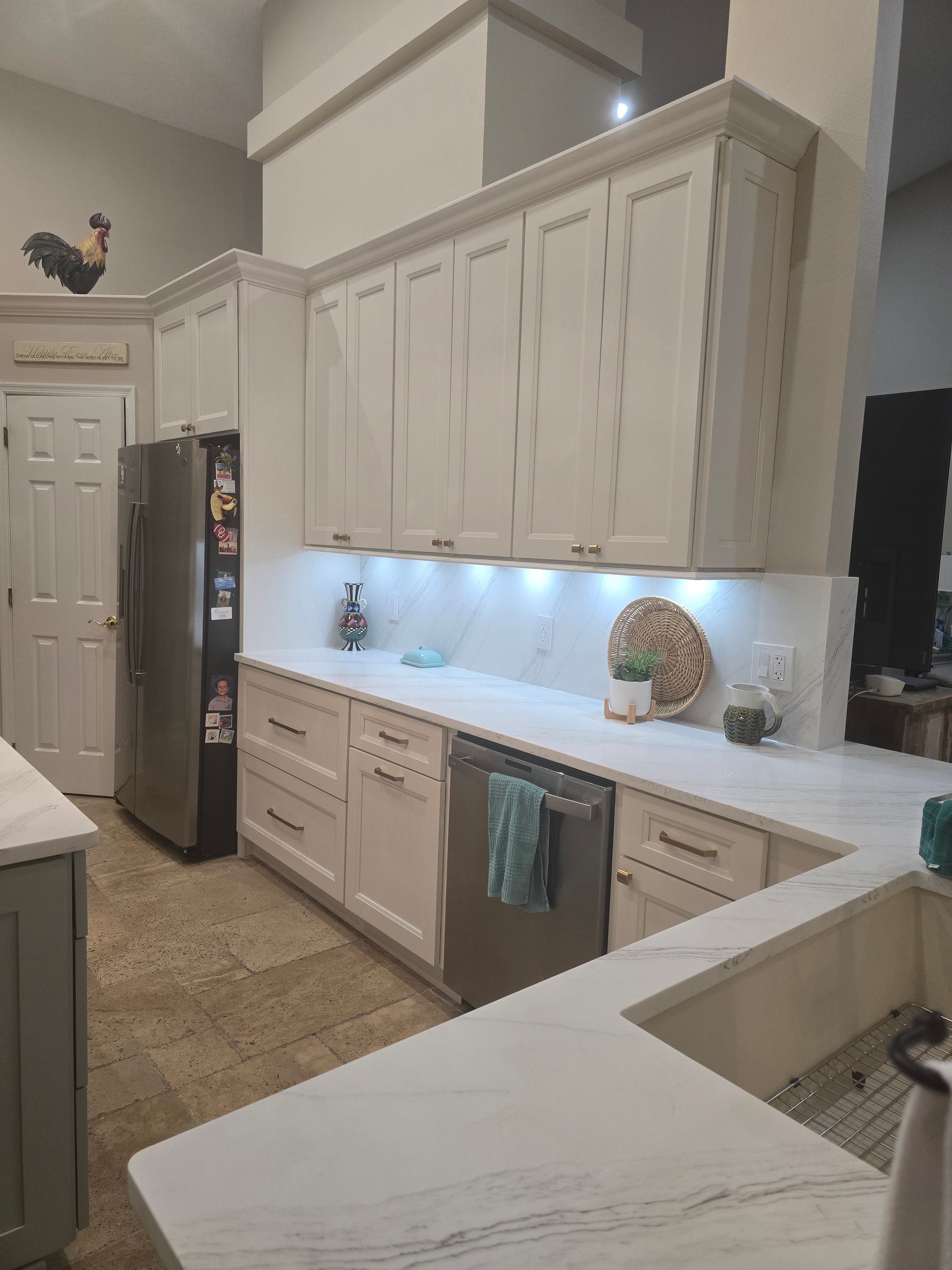 White raised panel kitchen with quartz countertops by 1 Stop Cabinets