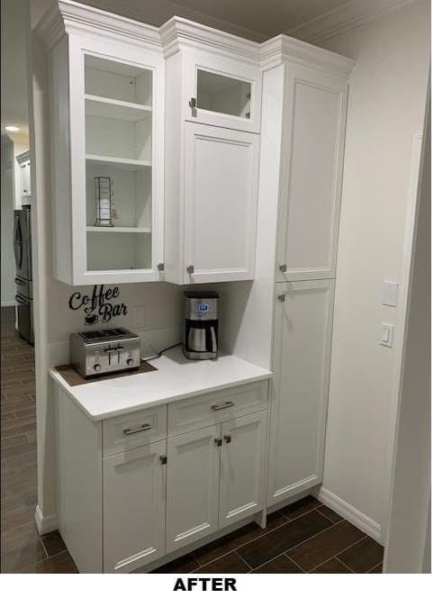 White shaker coffee bar with glass cabinet doors by 1 Stop Cabinets