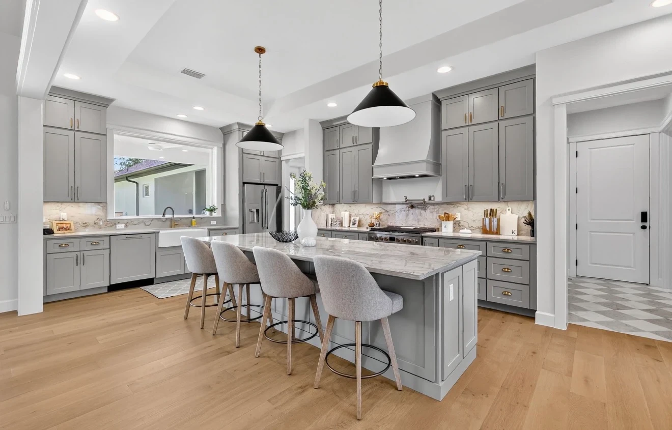 Modern kitchen remodel with white cabinetry